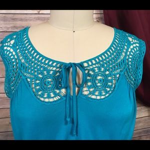 Blue dress with lace yoke detail.